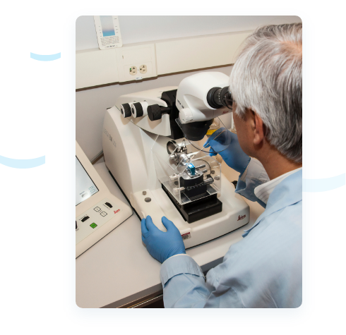 Image of a man using lab equipment Image of a man using lab equipment